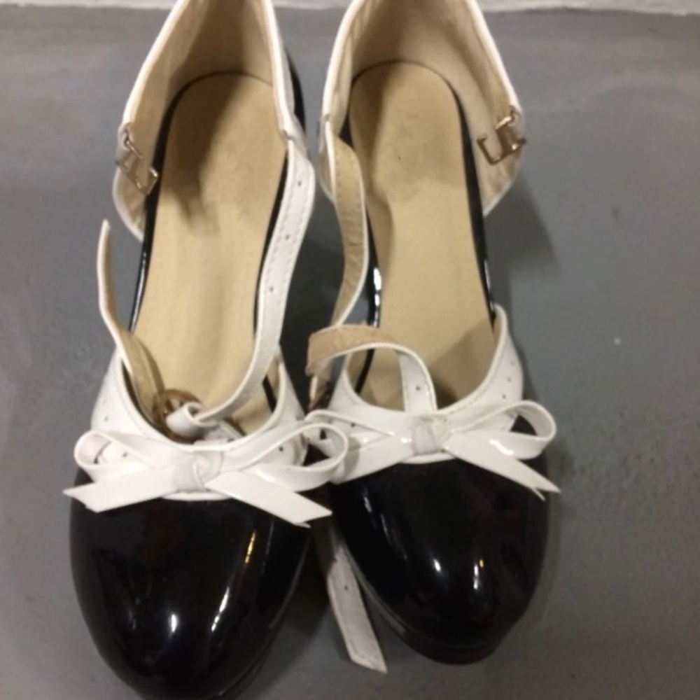 Black and white patent high heels